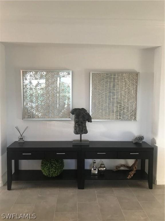 sitting room with light tile patterned floors