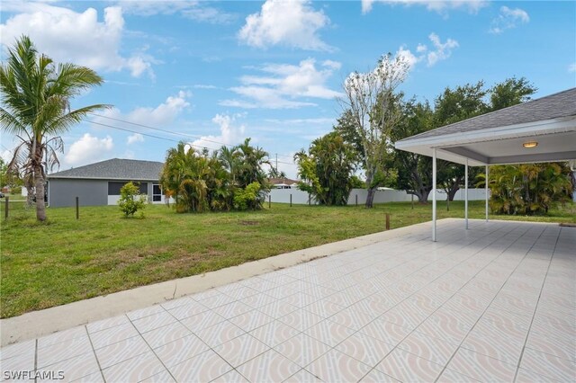 view of patio with a carport