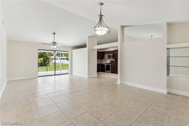 interior space with ceiling fan and light tile patterned flooring