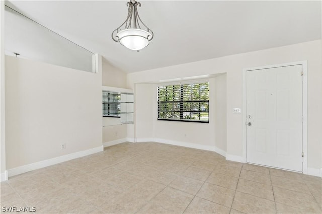 interior space featuring vaulted ceiling