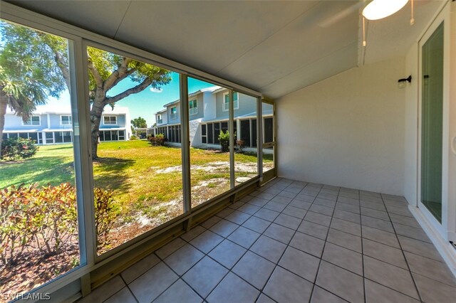 unfurnished sunroom featuring a healthy amount of sunlight