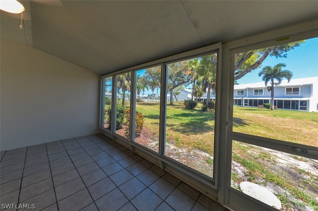 unfurnished sunroom featuring a healthy amount of sunlight