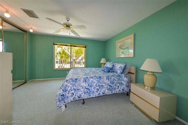 carpeted bedroom featuring ceiling fan