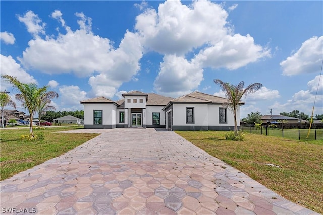 view of front of property with a front lawn