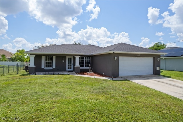 single story home featuring a front yard and a garage