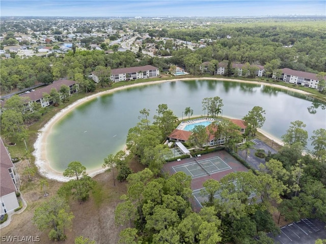 bird's eye view with a water view