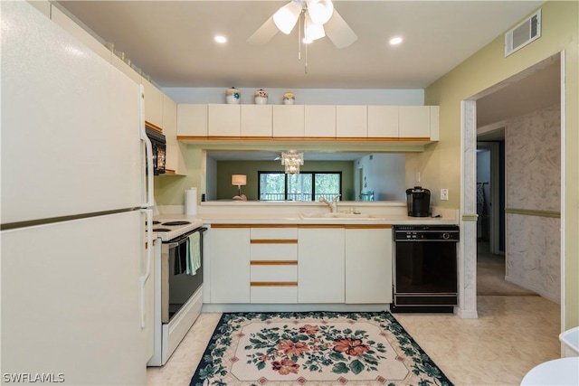 kitchen featuring black appliances, white cabinetry, sink, kitchen peninsula, and ceiling fan