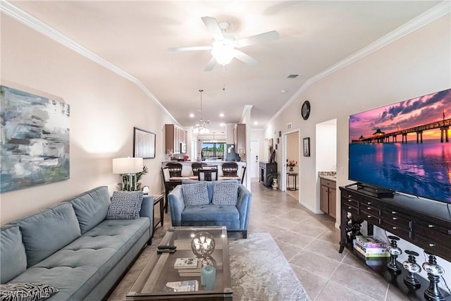 tiled living room featuring ceiling fan with notable chandelier, ornamental molding, and vaulted ceiling