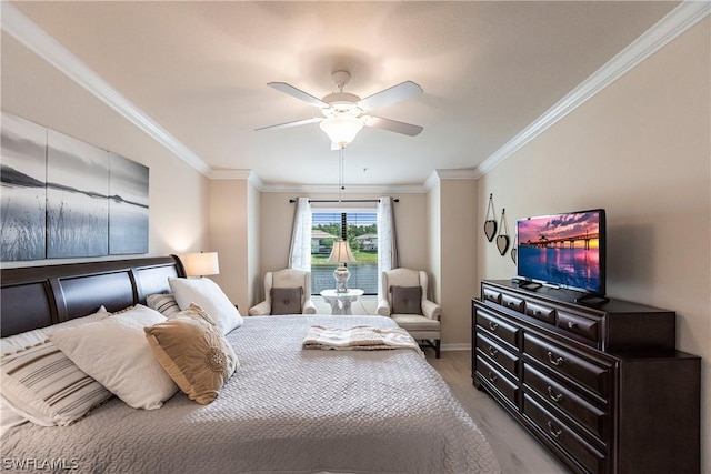 bedroom featuring ceiling fan, crown molding, and light wood-type flooring