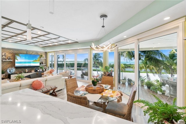 sunroom / solarium featuring a wealth of natural light