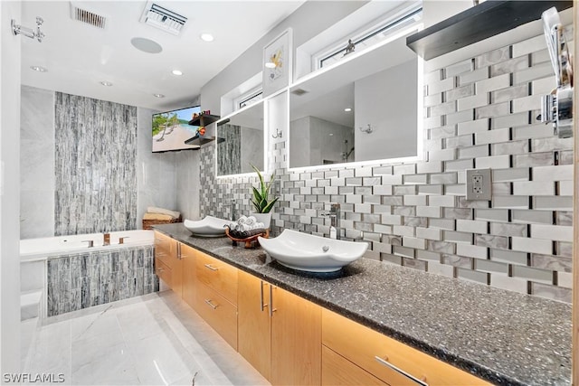 bathroom featuring vanity, decorative backsplash, plus walk in shower, and tile walls