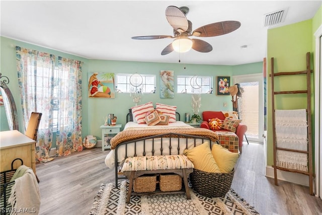 bedroom featuring ceiling fan and light wood-type flooring