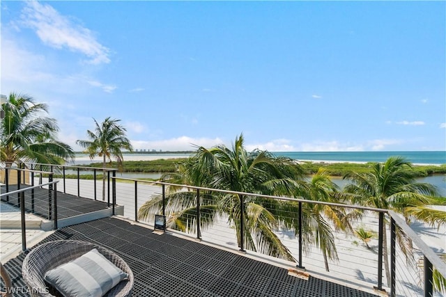 balcony featuring a water view