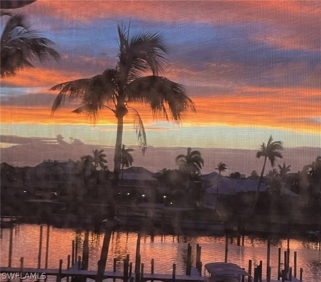 18080 San Carlos Blvd Unit 724, Fort Myers Beach, FL 33931 - property view of water featuring a dock