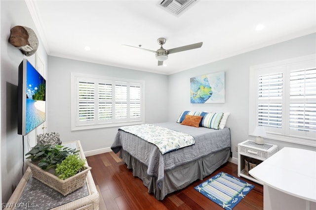 18080 San Carlos Blvd Unit 724, Fort Myers Beach, FL 33931 - bedroom featuring visible vents, dark wood-type flooring, ornamental molding, a ceiling fan, and baseboards