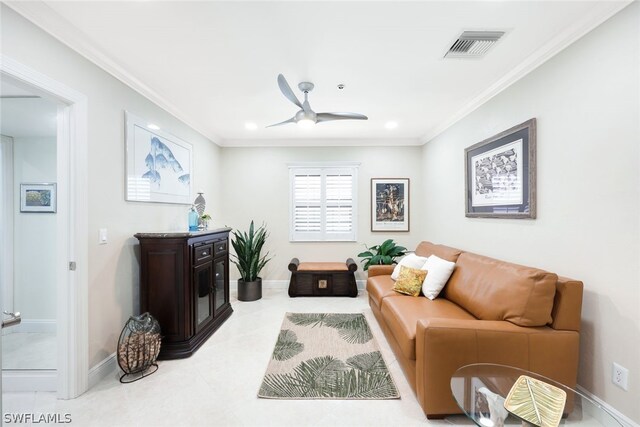 tiled living room featuring ceiling fan and ornamental molding