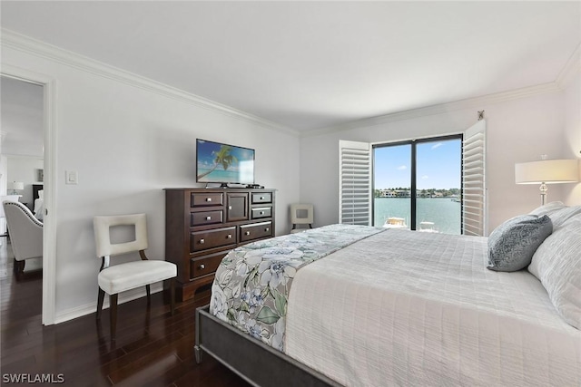 bedroom with access to exterior, dark wood-type flooring, and ornamental molding