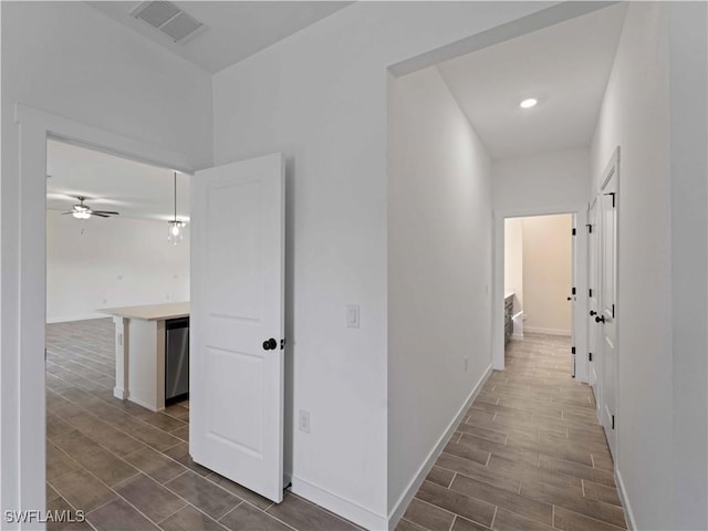 2917 NW 19th Ter, Cape Coral, FL 33993 - corridor with wood finish floors and baseboards