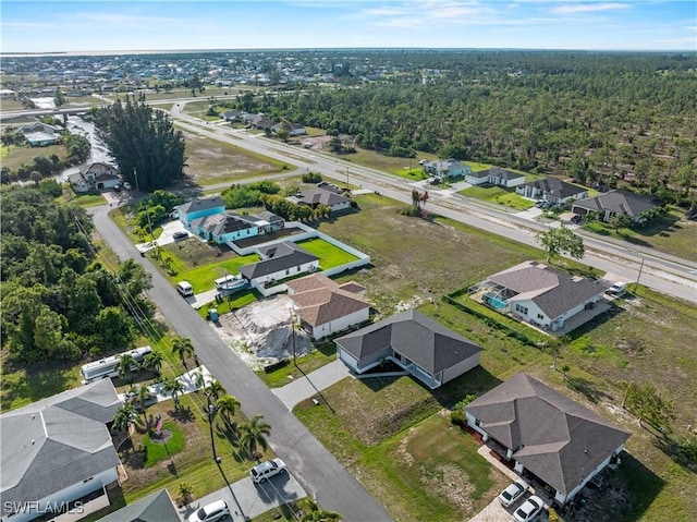 2917 NW 19th Ter, Cape Coral, FL 33993 - aerial view of property and surrounding area featuring nearby suburban area