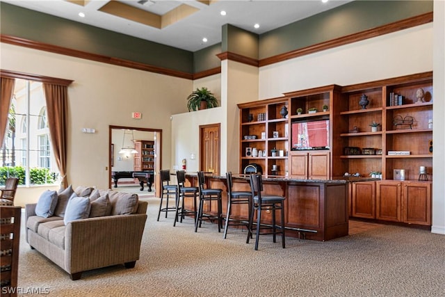 bar with light carpet, a high ceiling, and billiards