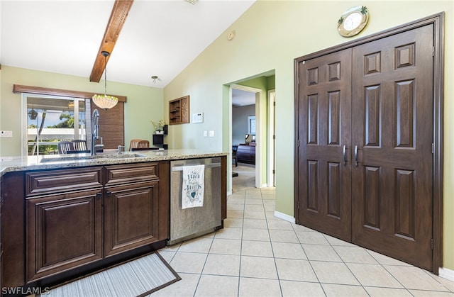 kitchen with decorative light fixtures, sink, lofted ceiling with beams, light tile patterned flooring, and stainless steel dishwasher