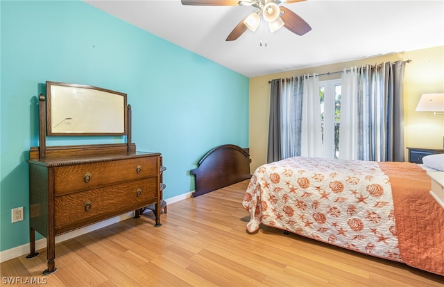 bedroom featuring ceiling fan and light wood-type flooring