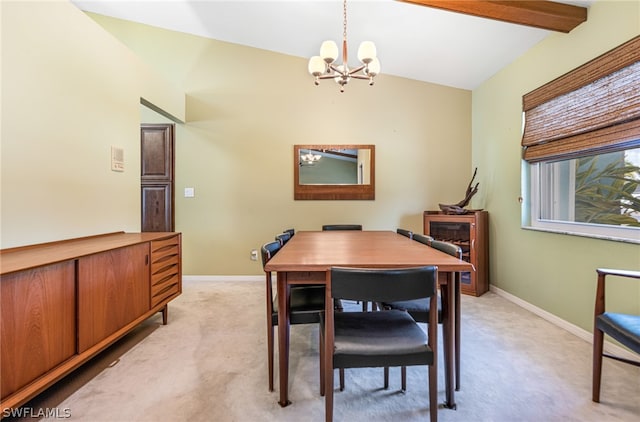 carpeted dining room with vaulted ceiling with beams and a notable chandelier