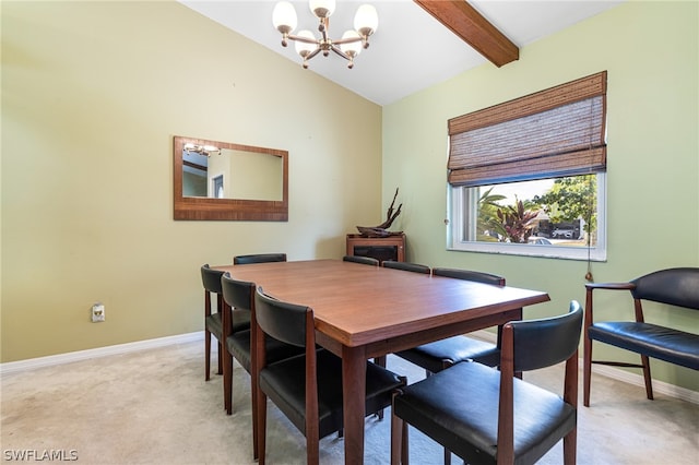 dining space featuring an inviting chandelier, light colored carpet, and vaulted ceiling with beams