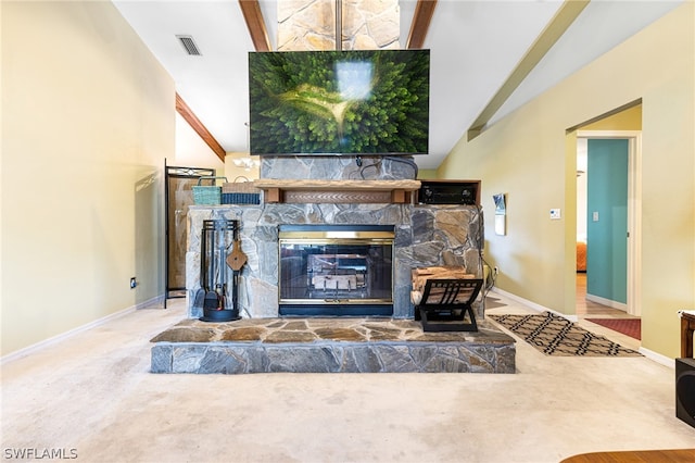 living room featuring carpet, lofted ceiling with beams, and a fireplace