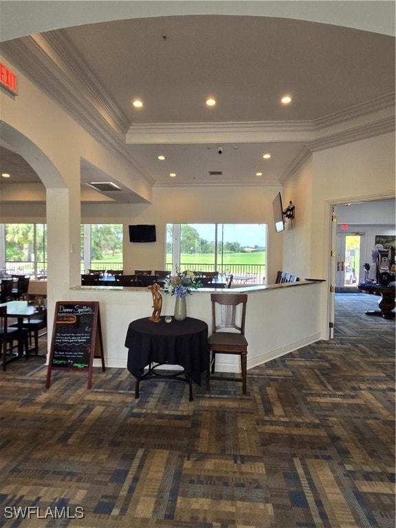 interior space featuring crown molding