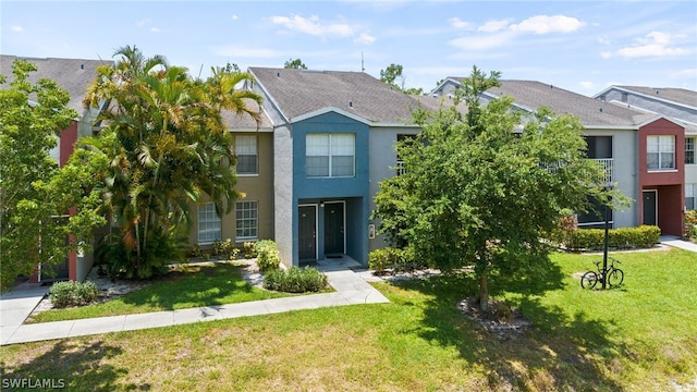 view of front of property with a front lawn