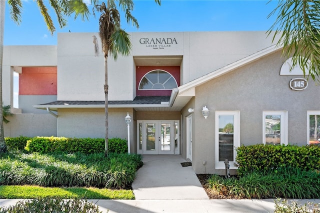 view of exterior entry with french doors