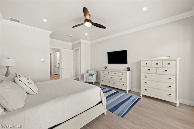 bedroom with ceiling fan, light hardwood / wood-style flooring, and crown molding