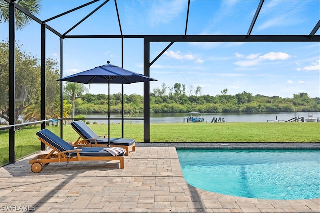 view of swimming pool with a lanai, a yard, a water view, and a patio