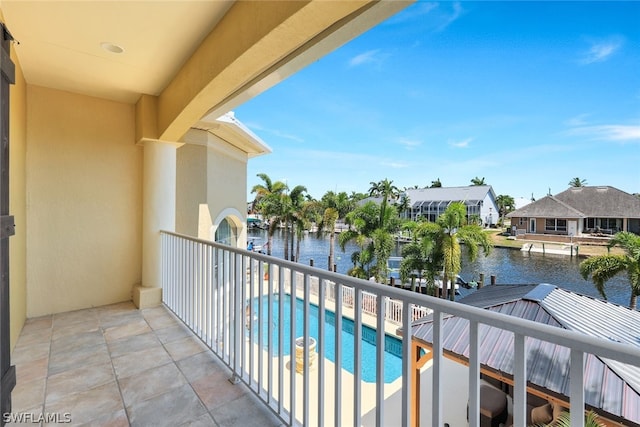 balcony featuring a water view