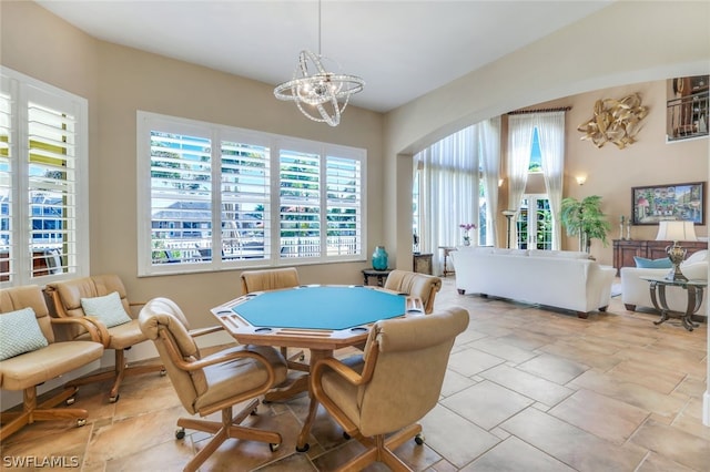 playroom featuring a chandelier