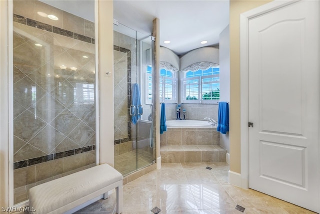 bathroom featuring plus walk in shower