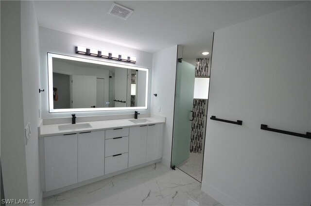 bathroom with tile flooring, oversized vanity, and dual sinks