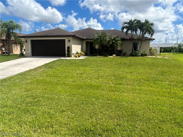 ranch-style home featuring a front lawn and a garage