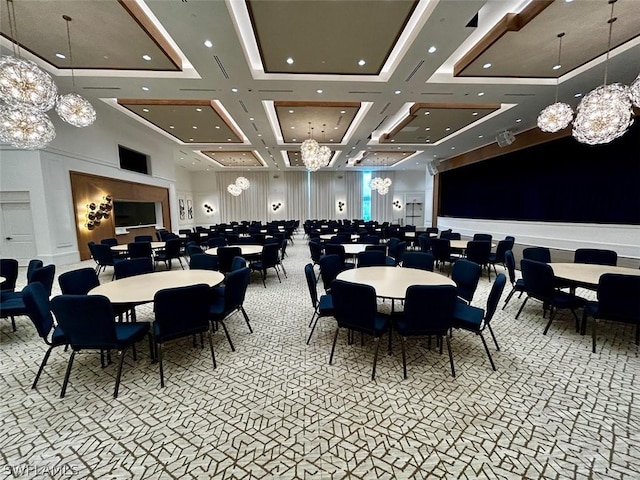 dining area featuring coffered ceiling, beam ceiling, a high ceiling, and a chandelier