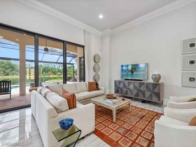 living room featuring crown molding