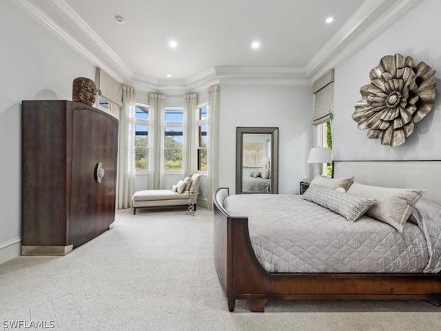 bedroom with light colored carpet and ornamental molding