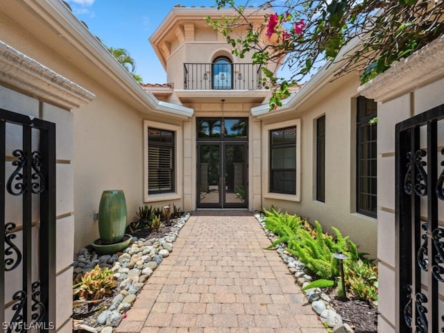 property entrance featuring french doors