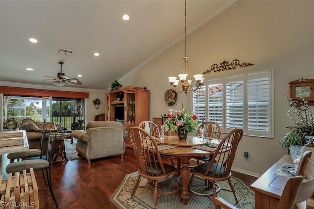 dining room featuring high vaulted ceiling, dark wood-type flooring, ornamental molding, and ceiling fan with notable chandelier