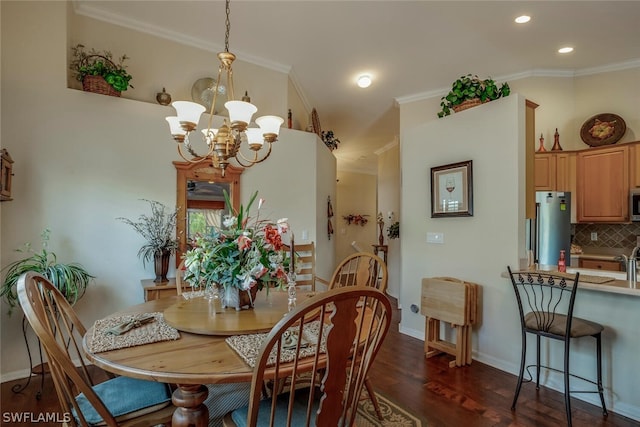 dining room featuring baseboards, a chandelier, ornamental molding, recessed lighting, and dark wood-type flooring