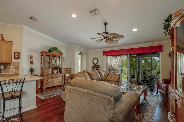 living room with ceiling fan, french doors, crown molding, and dark wood-type flooring