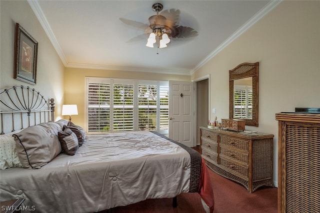 carpeted bedroom with crown molding and a ceiling fan