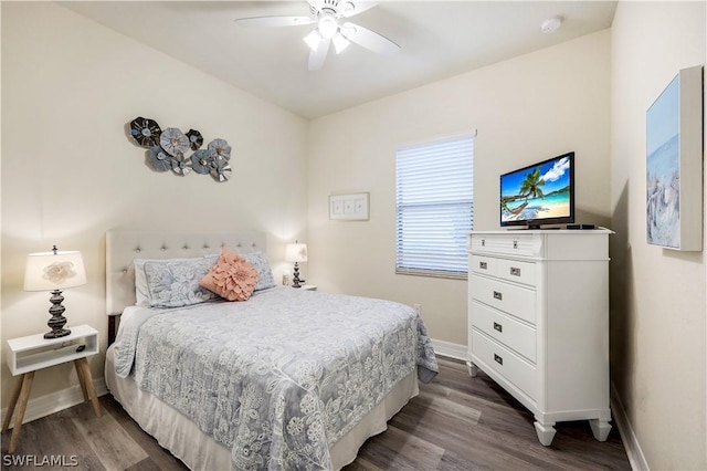 bedroom featuring dark wood-type flooring and ceiling fan