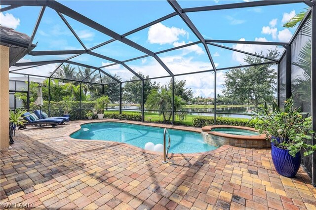 view of pool with glass enclosure, an in ground hot tub, and a patio