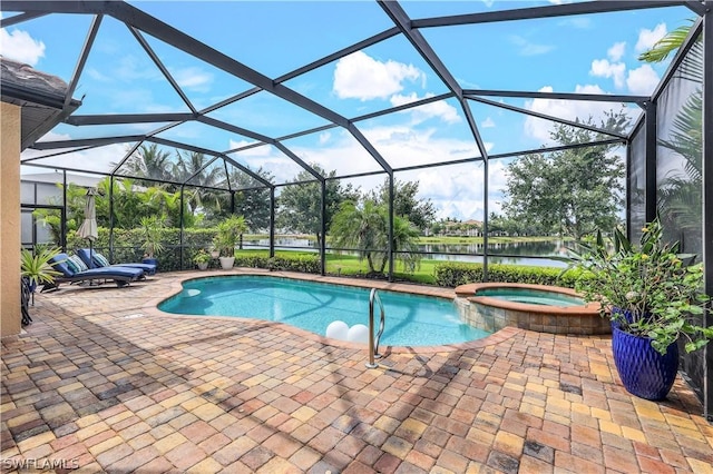 view of pool with an in ground hot tub, a water view, a lanai, and a patio area